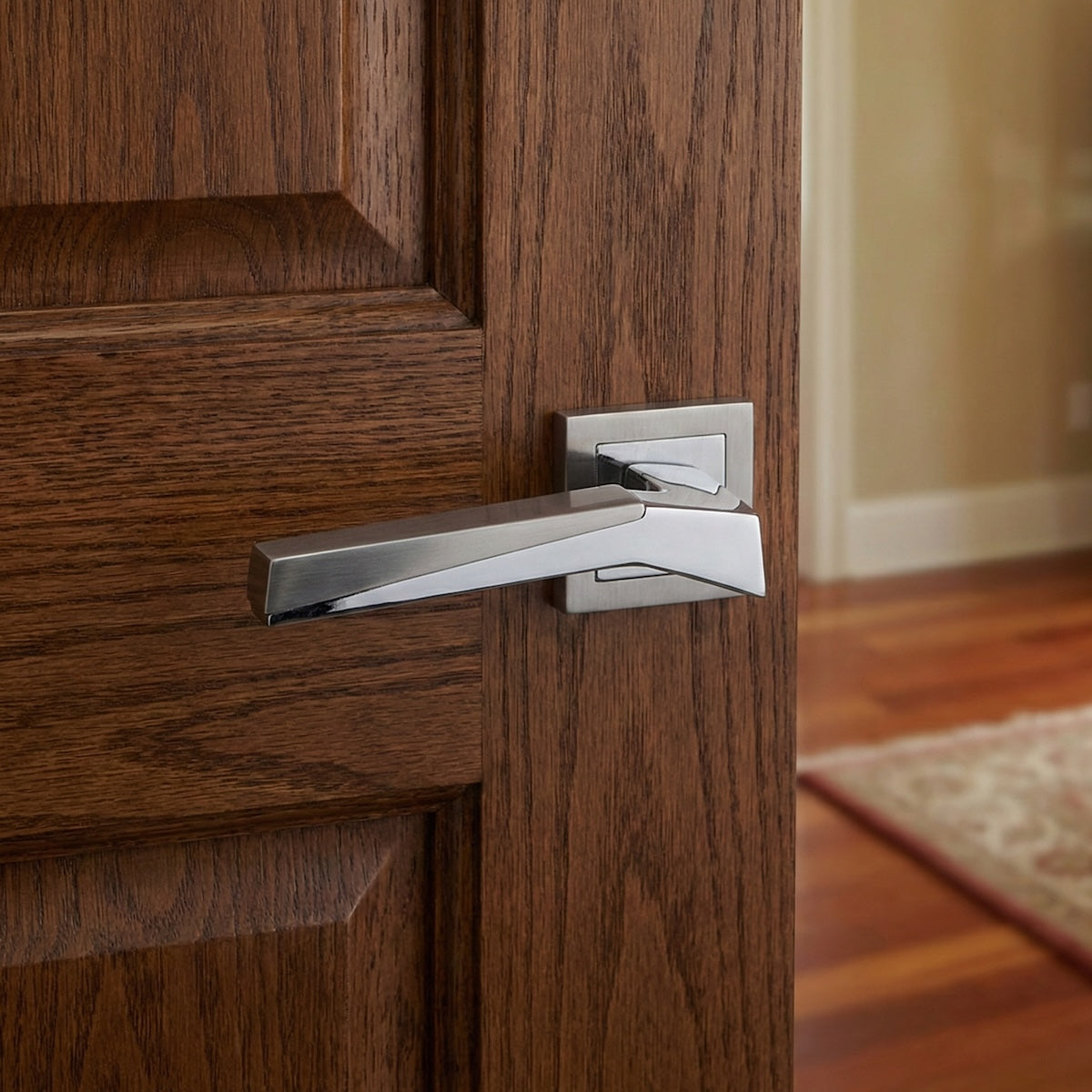 '120' model zamak door handle with square rosette in a two-tone finish