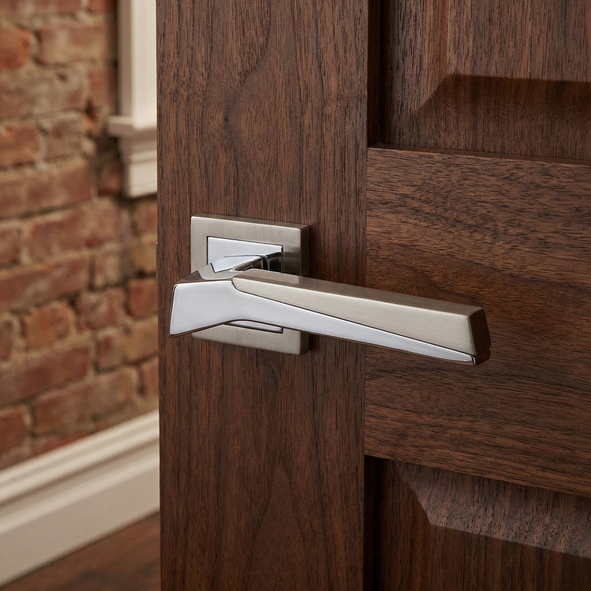 '120' model zamak door handle with square rosette in a two-tone finish