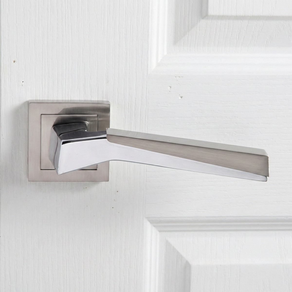 '120' model zamak door handle with square rosette in a two-tone finish