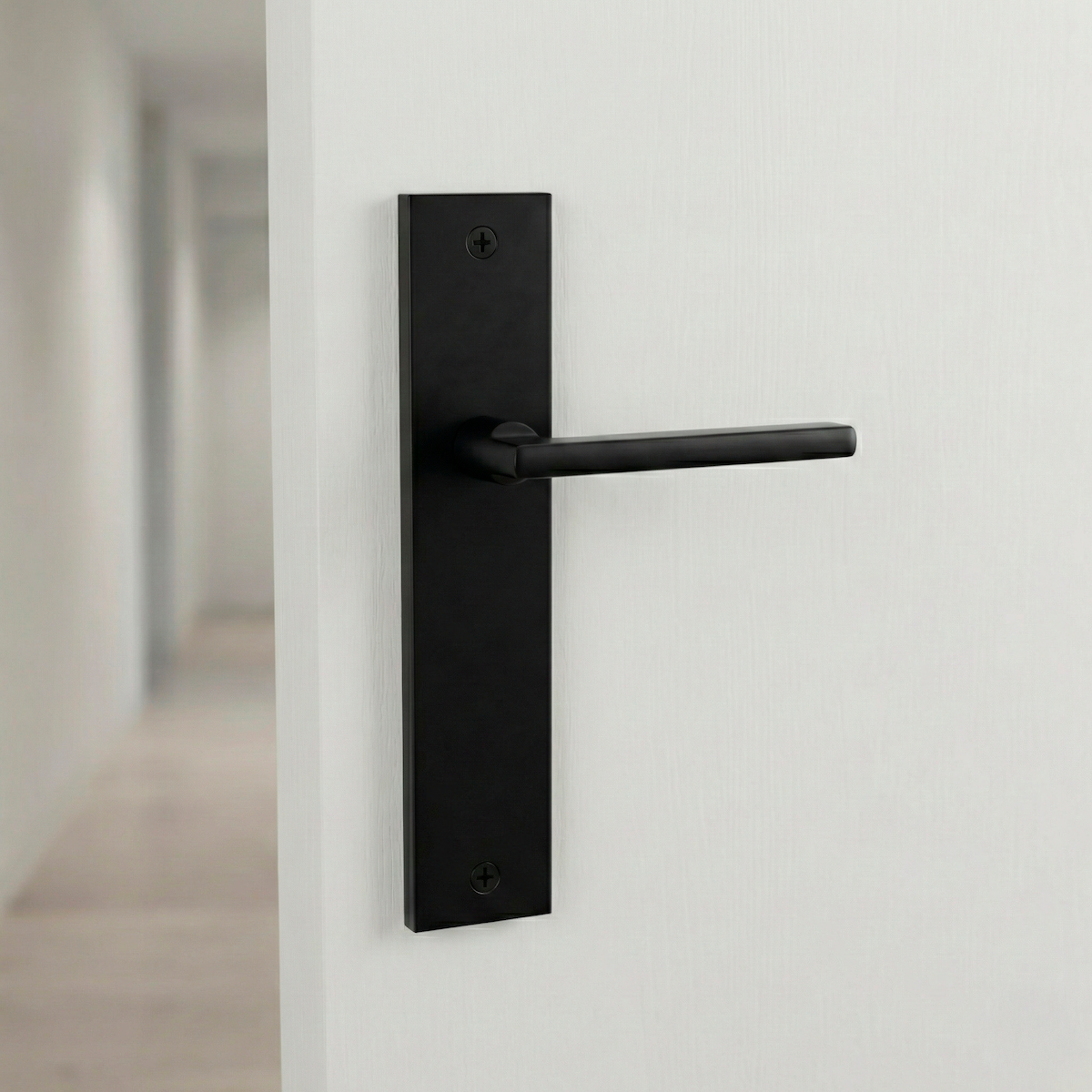 '530' model door handle with a matte black rectangular aluminum plate
