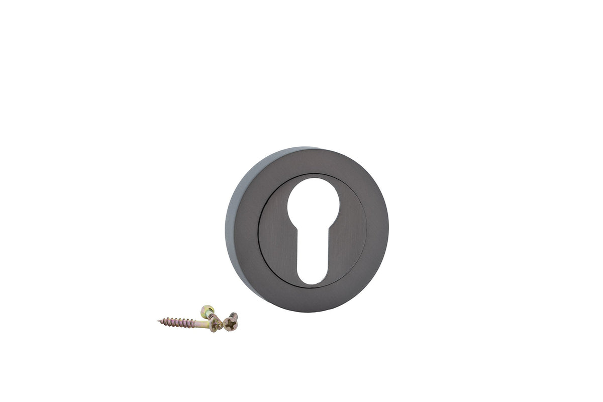 Round escutcheon with pear-shaped keyhole in graphite finish for doors